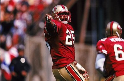 Charlie Garner San Francisco 49ers points from the field at the ga- Old Photo