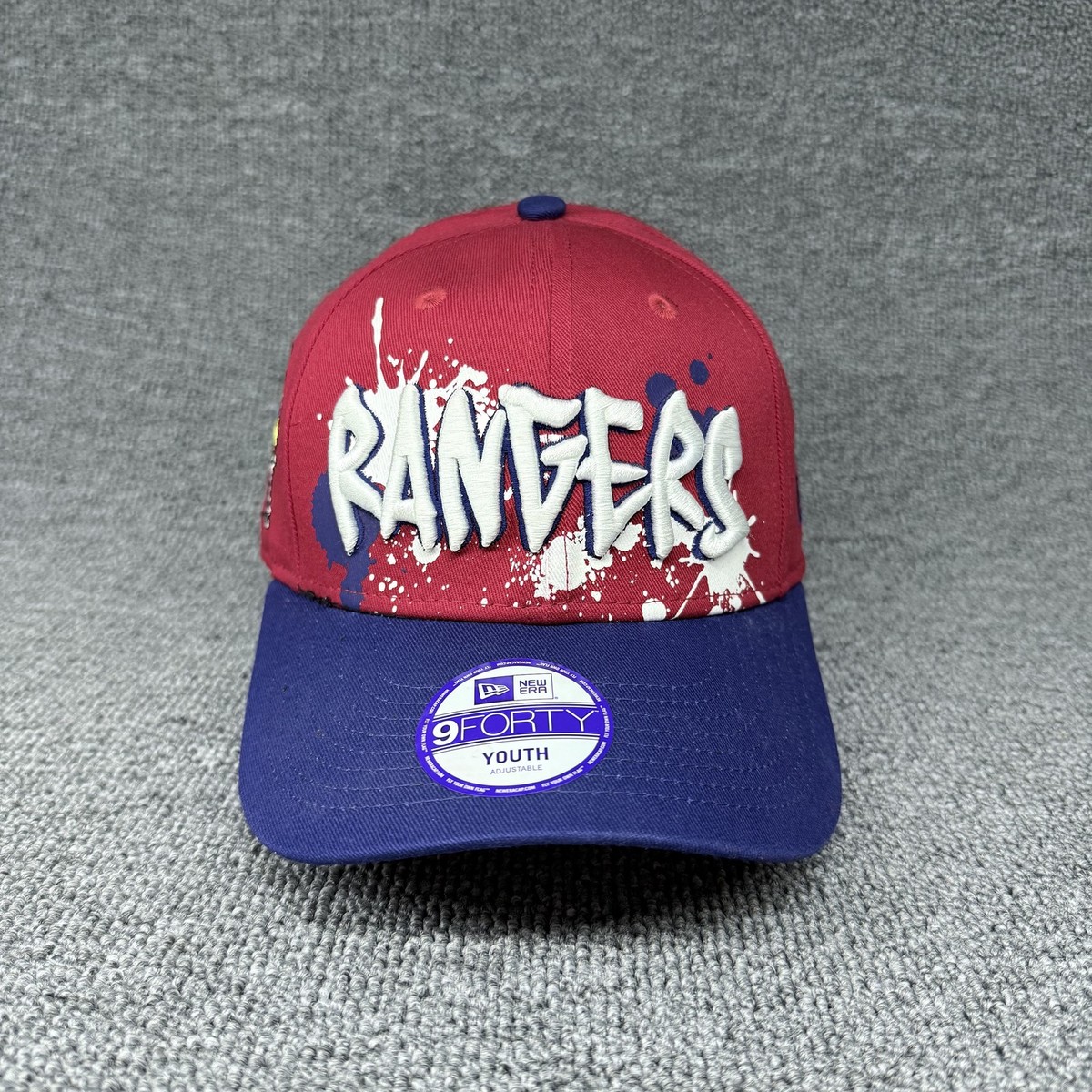 New Era 9FORTY Youth Texas Rangers Paint Splatter Mascot Adjustable Hat Red Navy