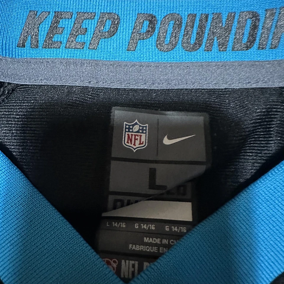 Camiseta de fútbol americano juvenil Carolina Panthers grande 14/16 negra NFL Cam Newton Nike Foto 2 de 4