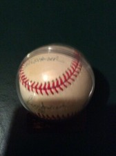 Reggie Jackson autographed baseball in case