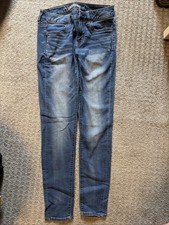 American Eagle Super stretch Women  s Jeggings Size 4 Regular Medium Wash