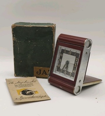 Travel jazz alarm clock with its original box, lacquered aluminum working condition