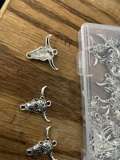 Lot of 31 Western Metal Cow's Head Jewelry with Hole