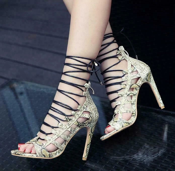 Black high heels in Grace's snake skin pattern - KeeShoes