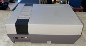 NES Console Bundle W/ Super Mario Bros. 1,2,3 & Controller/Gun & 8 Games