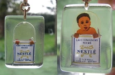 1960 ancien porte clé nesté lait concentré animé BOURBON