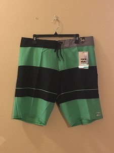 black and green swim trunks