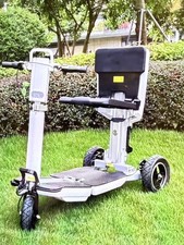 Atto folding mobility scooter in white colour and barely used.