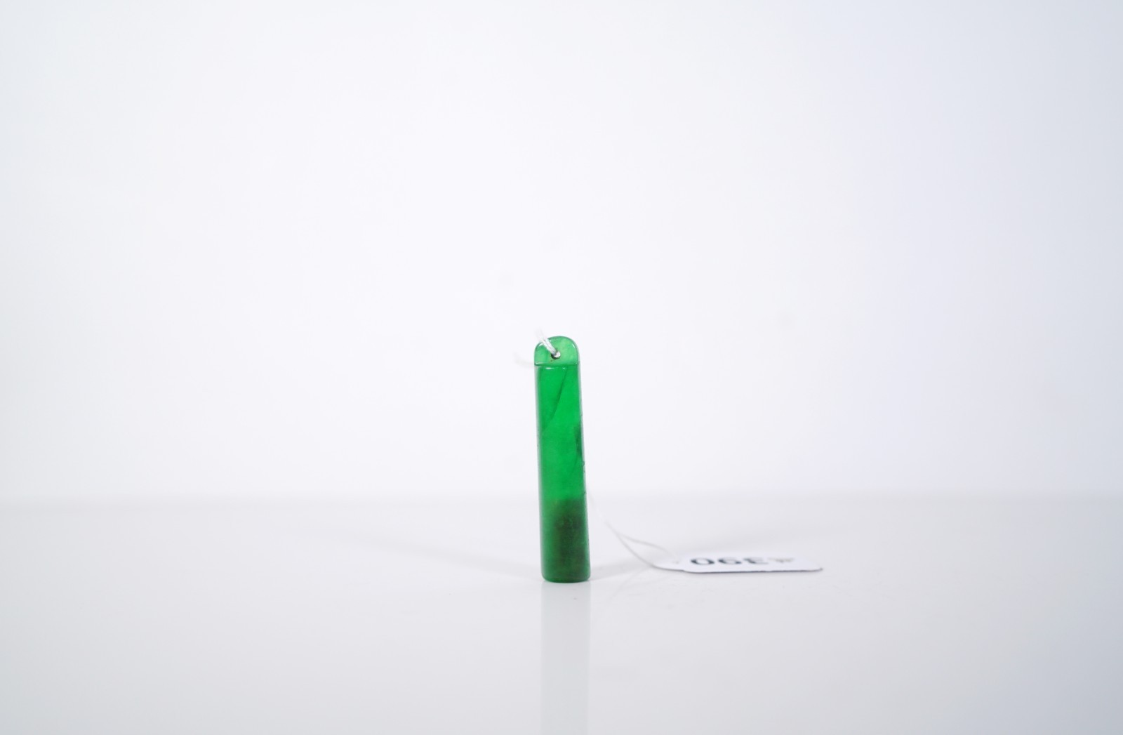 A Green Quartz Stone Tube Pendant