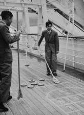 Crown Prince Akihito playing deck shuffleboard on liner 'President- Old Photo