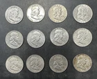 Lot of 12 Old U.S. Franklin Half Dollar 90% Silver Coins Mostly Look AU Loc#N23