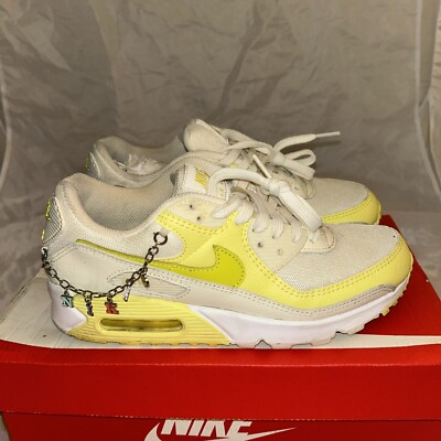 yellow air max with charms