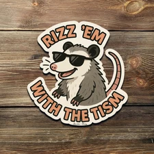 Rizz ’Em With the Tism Sticker – Funny Possum Meme Vinyl Decal