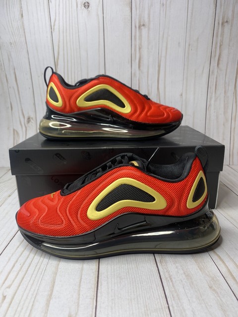 red and gold nike shoes