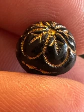 black glass with gold tone victorion button tunnel shank