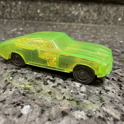 Vintage Made in Japan Green Skeleton Friction Tin Toy Car
