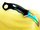 Mtech Rainbow Karambit features an aluminum handle with G-10 inserts  — photo 2
