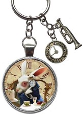 alice in wonderland figure keyring white rabbit clock trumpet looking glass keyc