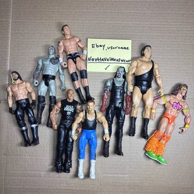 WWE Mattel Wrestling Action Figure Lot of 8 The Rock Undertaker Stone Cold
