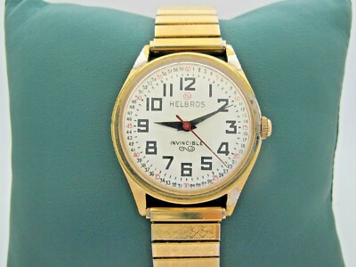 VINTAGE HELBROS INVINCIBLE MANUAL WIND GOLD PLATED WATCH WITH STRETCH BAND 