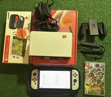 Nintendo Switch OLED White 64gb (Mario Striker, Case and 125gb Micro sd card)