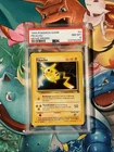1999 Pokémon WB First Movie Black Star Promo #4 Pikachu PSA 8