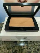 Merle Norman Total Finish....  Shade is SANDY BEIGE....NEW