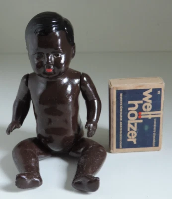 Puppe,Stehsitzbebi,Zelluloid,ca.14 cm,dunkelhäutig - Bild 1 von 4