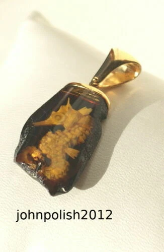 Collane e pendagli di lusso in oro con pietra principale ambra