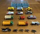 Lot of 13 Vintage Matchbox Cars, Trucks & Motorcycles In Blue Plastic Car Holder