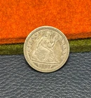 (#102361) Seated Liberty Quarter:  1857.  XF.  Great luster.   (see video!)
