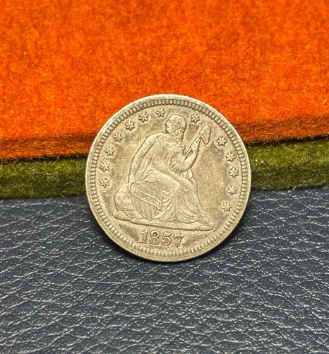 (#102361) Seated Liberty Quarter:  1857.  XF.  Great luster.   (see video!)