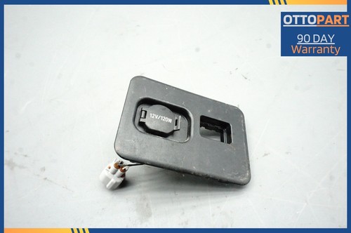 Black 2007-2012 Lexus LS460 LS460L center console auxiliary adapter with 12V/120W label and side ports on blue OTTO part page.