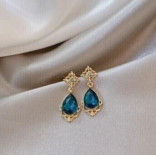 Pendiente colgante/gota de topacio azul simulado corte pera de 2 quilates enchapado en oro amarillo de 14 k Foto 4 de 4