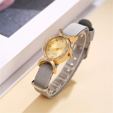 Elegant Women's Quartz Wristwatch with Oval Crystal and Gold Tone Nylon Strap