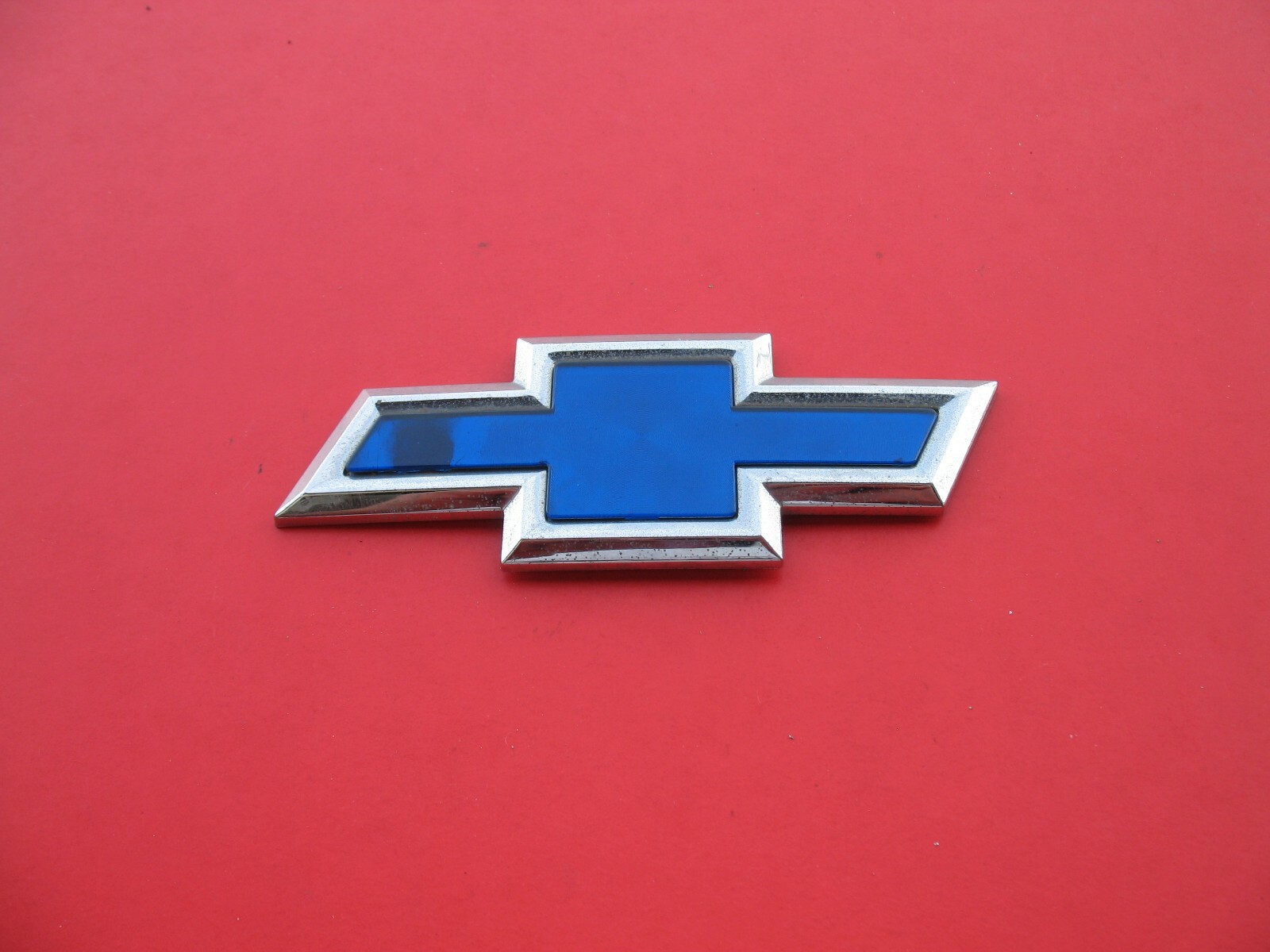 Какой значок у шевроле