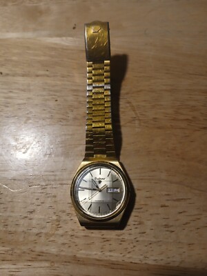 PULSAR Vintage Gold Tone Time And Date Watch 