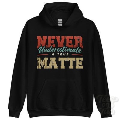 NEVER UNDERSCHIMATE A TRUE MATTE HOODIE - Wear Your Name Proudly
