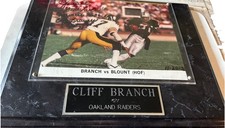Cliff Branch HOF Signed 8X10 Personal signed VS. Mel Blount HOF On Plaque RARE
