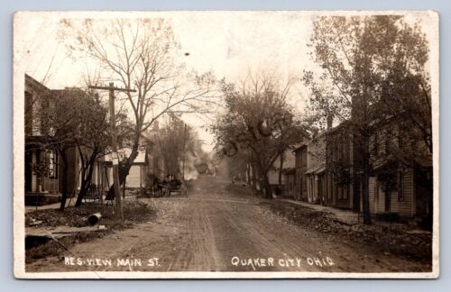 J87/Quaker City Ohio RPPC Postkarte c10 Cambridge Main Street Häuser 1696 - Bild 1 von 4