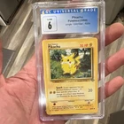 Wizards of the Coast Pikachu Pokémon TCG (1999) Jungle 60/64 Regular CGC 6