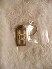 OE-BRONZE COLOR 30 NORTH BUILDING  KEY CHAIN 26028 MIP MINT IN PACKAGE   