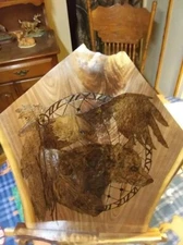 Eagle, wolf and bear wood burning on walnut 