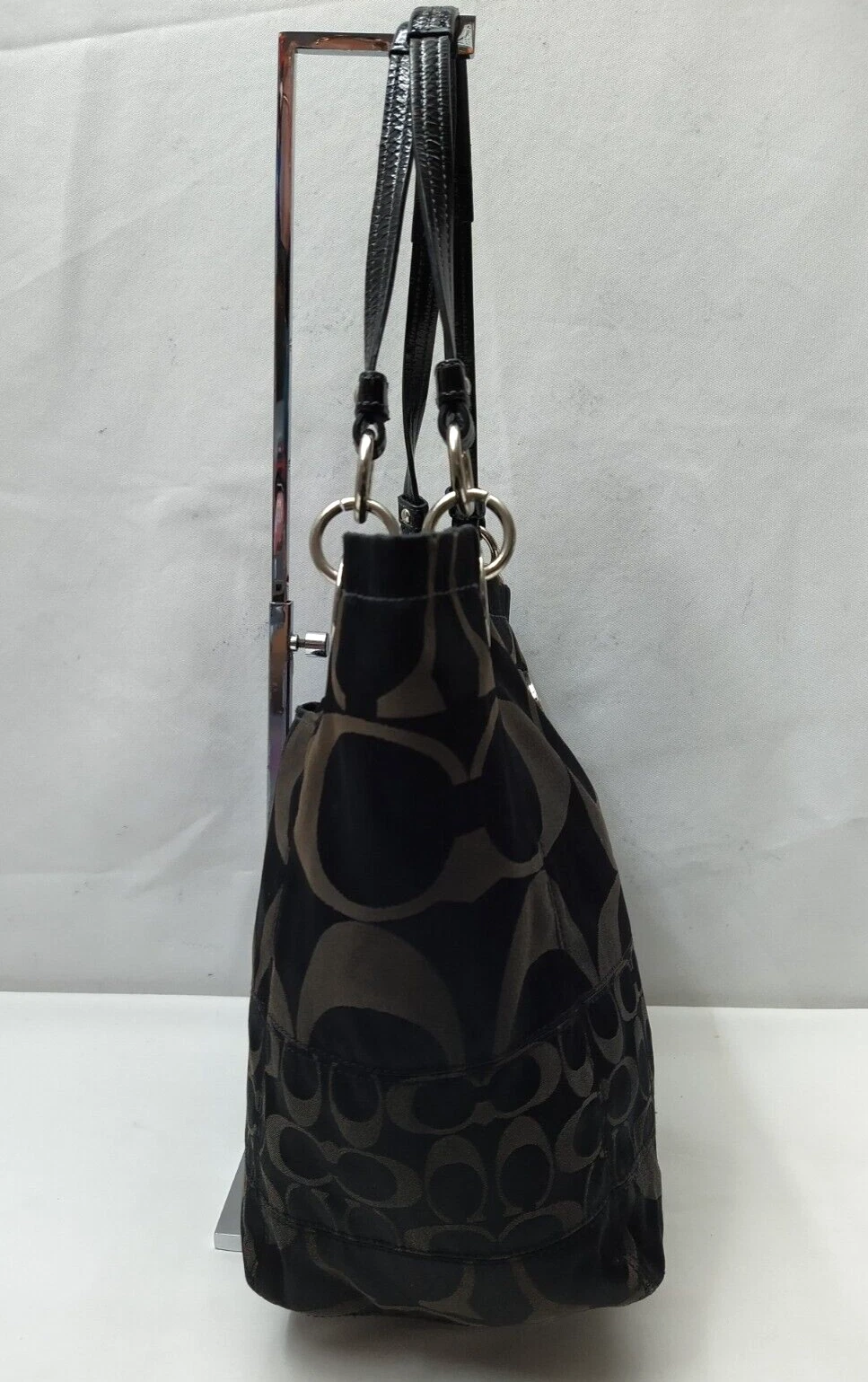 Borsa a tracolla Coach Alex Signature tela nera doppie mani con cerniera secchio tote