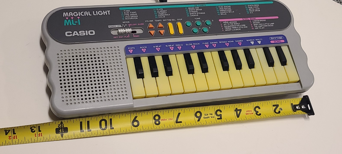 keyboard Casio Magical Light ML1 piano battery electric teaching