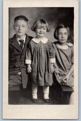 c1910's Children Cute Little Girl Smiling Curly Hair Studio RPPC Photo Postcard