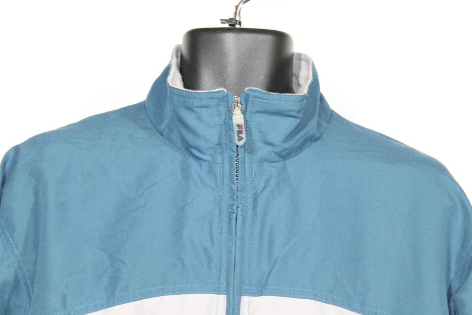 Chaqueta cortavientos vintage Fila para hombre pequeña azul gris años 90 cremallera completa Foto 2 de 4