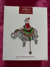 Hallmark Keepsake Ornament 2022 Pull String Elephant Santa Claus riding Wooden