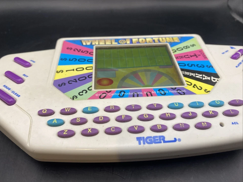 Juego portátil Tiger Electronics Wheel Of Fortune 1995 de colección con cartucho FUNCIONA Foto 3 de 4