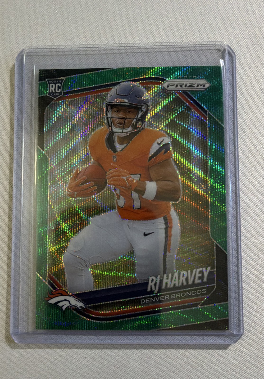 2025 Panini Prizm - Rookies RJ Harvey #303 Green Wave Prizm (RC)